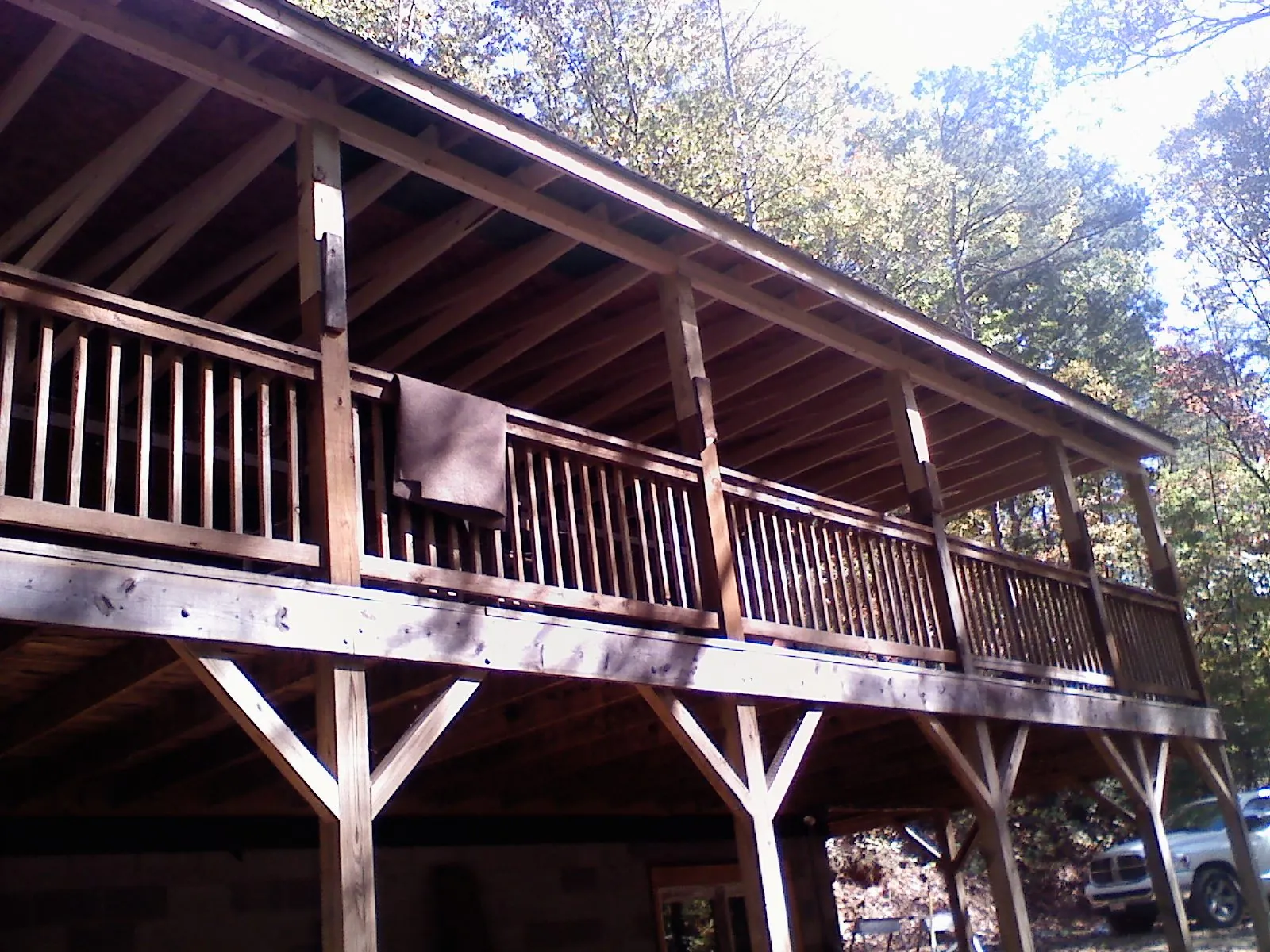 Timber framing under a new elevated porch and deck — Roof Leak Repair in Los Lunas by Roofing Brothers